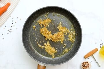 Sauteed Onions in Skillet for slow cooker beef stew.
