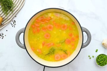 Carrots, potatoes, and broth simmered with roux and seasonings for base of chicken pot pie soup.