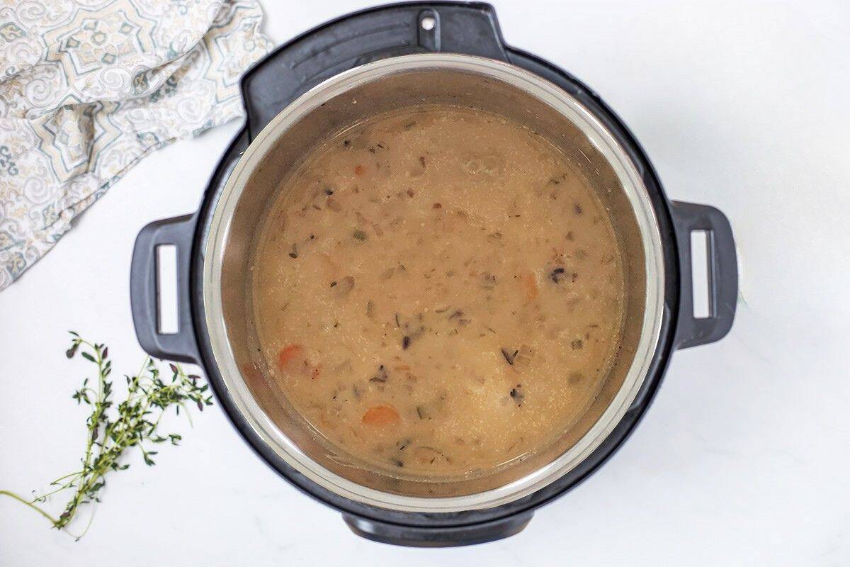 Vegetarian Instant Pot Wild Rice Soup Wild rice soup inside Instant Pot after thickened with cream and cornstarch.