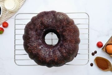 Chocolate Bundt Cake on cooling rack after being inverted onto cooling rack.