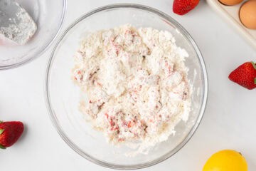 Diced strawberries tossed with dry ingredients.