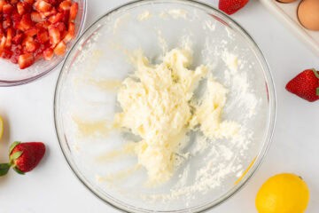 Butter and sugar creamed together for strawberry quick bread in large mixing bowl.