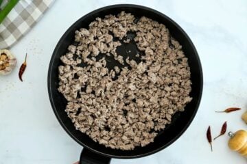 Browned ground turkey in skillet for base of egg roll bowl.