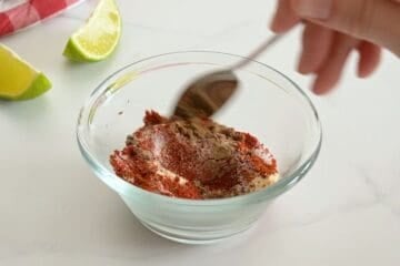 Spices for homemade fajita seasoning mixed together in small bowl.