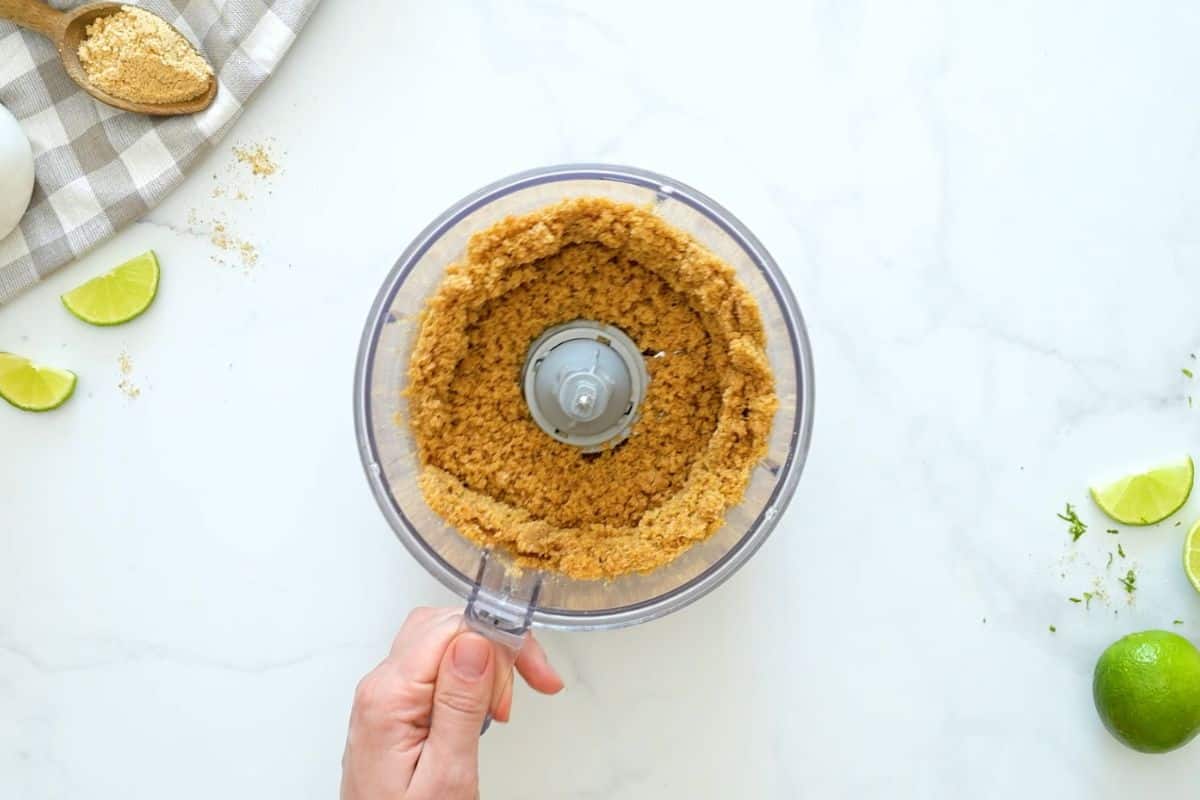 No Bake Key Lime Pie with Graham Cracker Crust Graham cracker crumbs, melted butter, and salt processed to resemble wet sand in food processor.