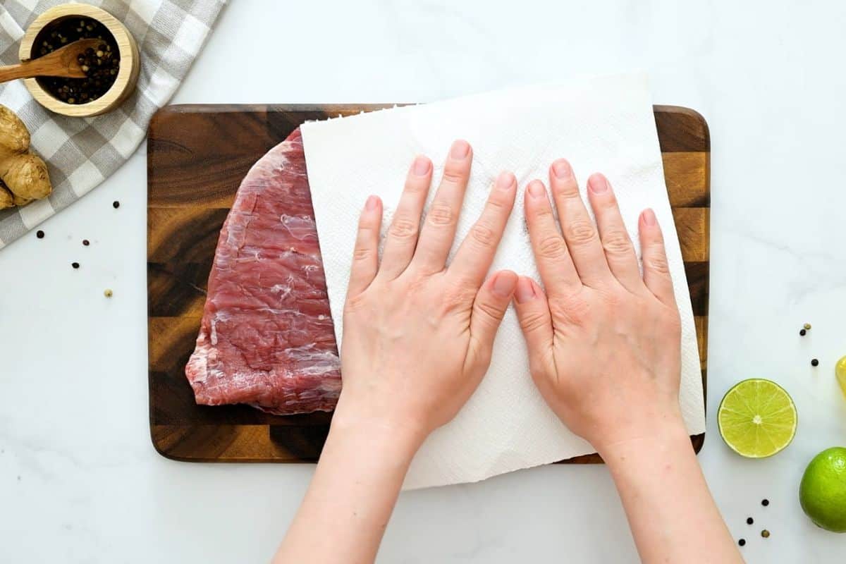 Flank Steak Marinade with Soy Paper towel blotting flank steak to remove excess moisture.