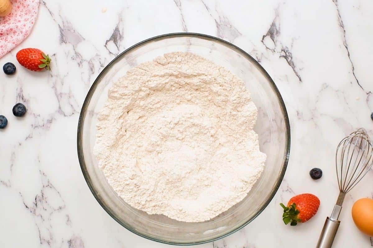 Waffles with Whole Wheat Flour Whole wheat flour mixed with baking powder, baking soda, and salt in large mixing bowl.
