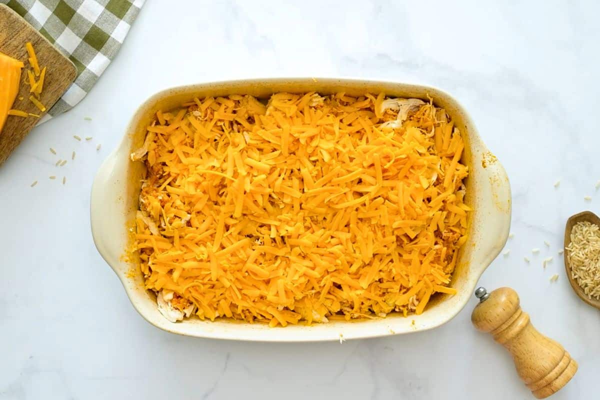 Buffalo Chicken and Rice with Rotisserie Chicken Chicken and buffalo rice topped with shredded cheddar cheese.
