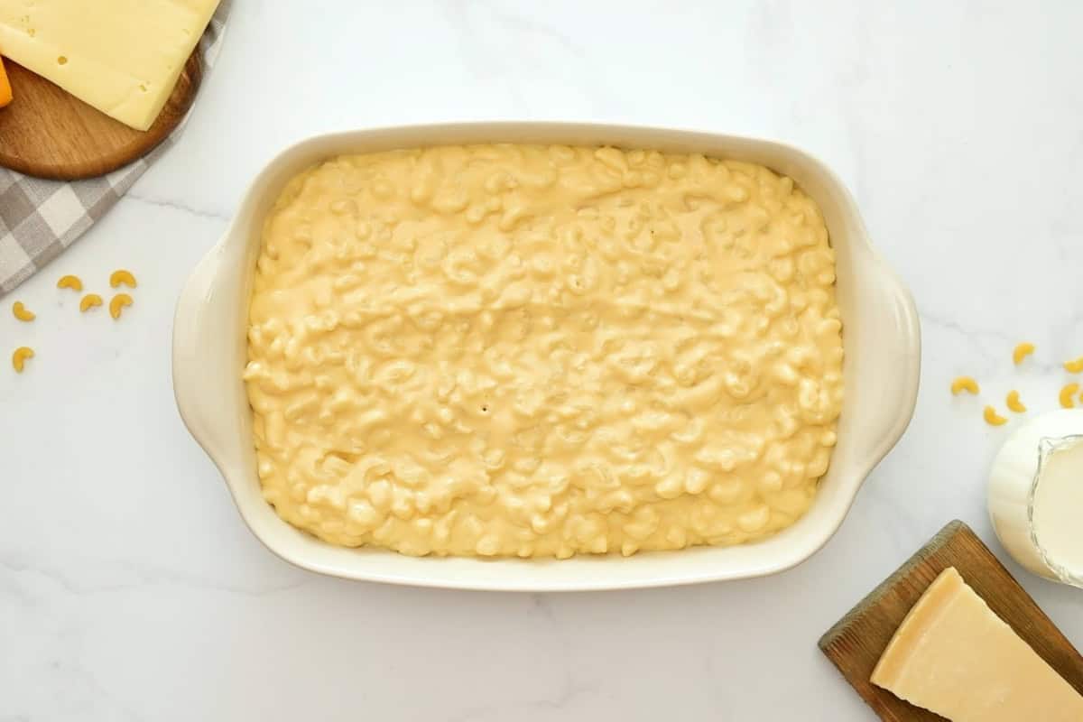 Baked Macaroni and Cheese Recipe Macaroni noodles coated in a from scratch cheese sauce in 9x13-inch baking dish.